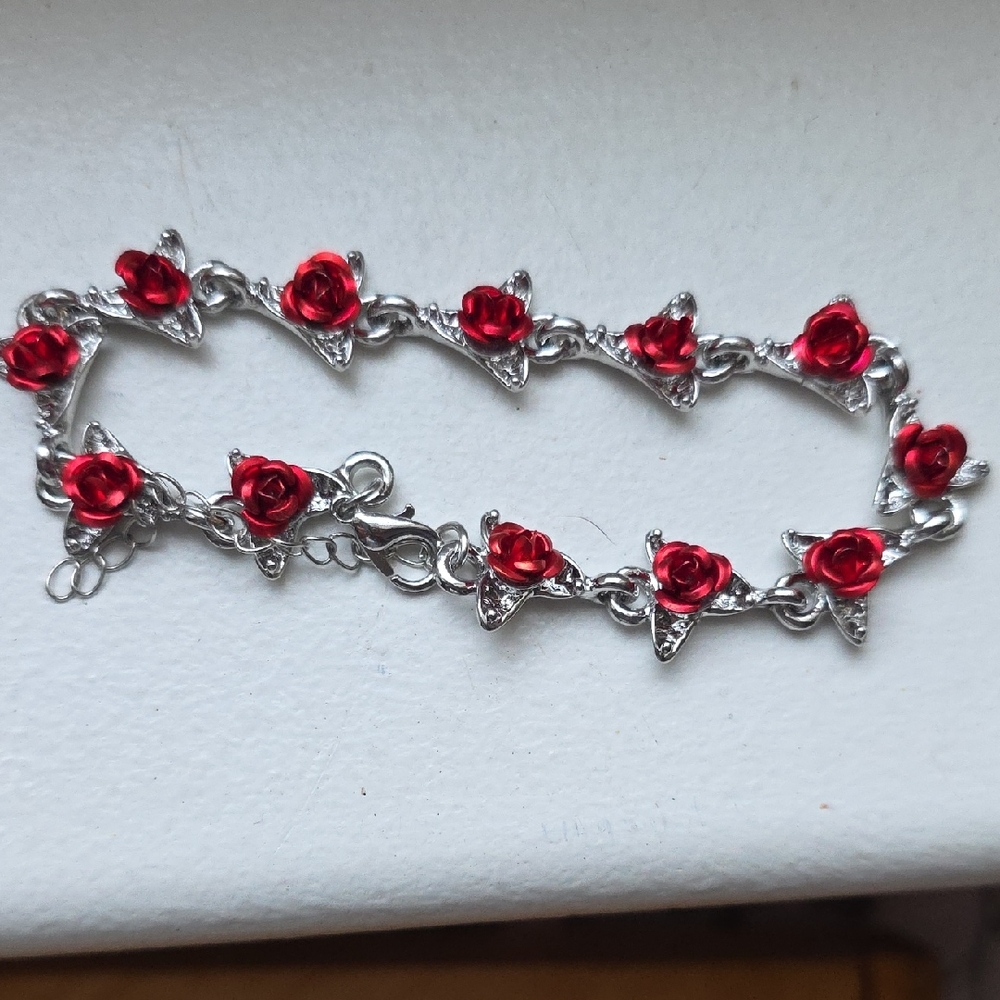 Elegant Silver Bracelet with Red Rose Accents